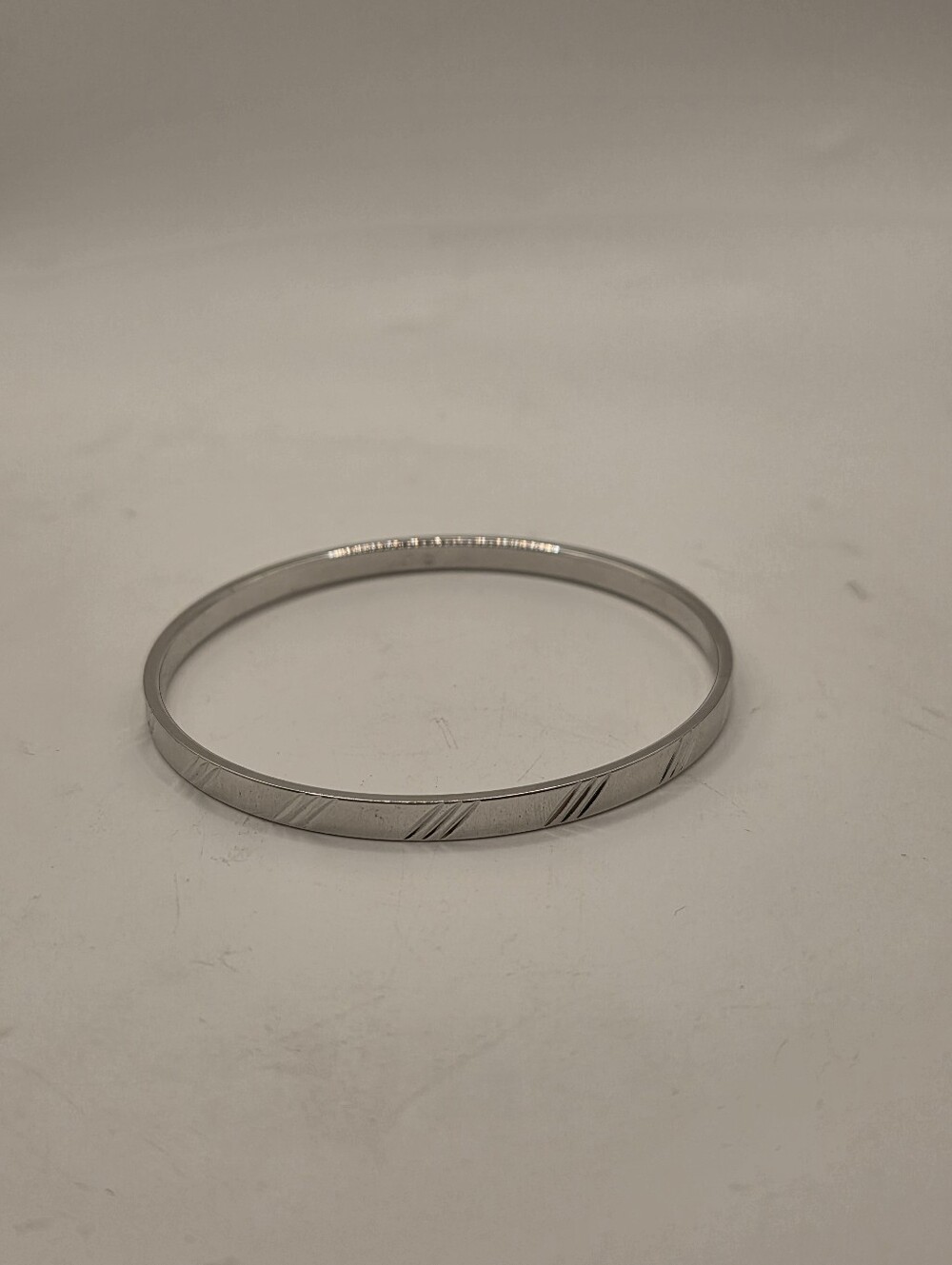 Vintage Monet Silver Tone Bangle Bracelet Textured Diagonal Slash Cut Out Design